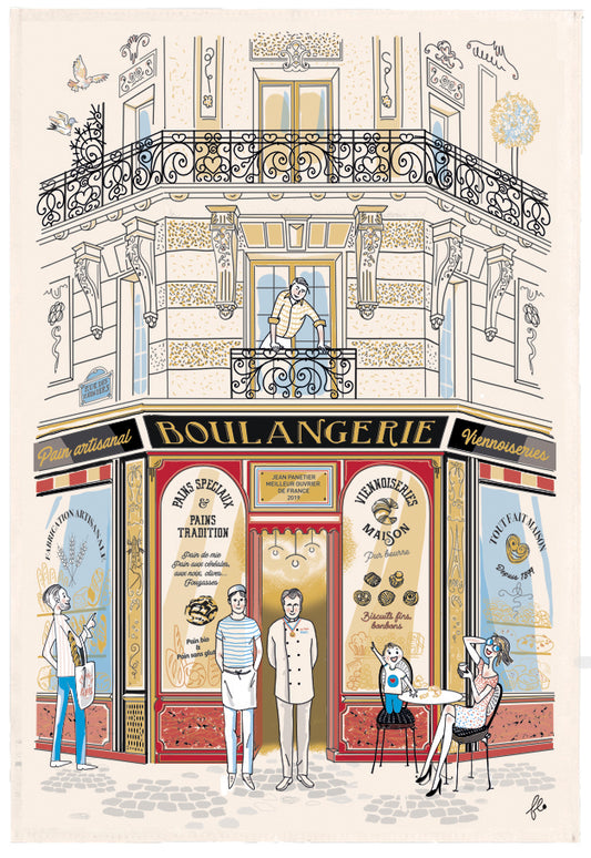 A printed tea towel featuring an illustration of a French bakery facade with people and pastries depicted on it.
