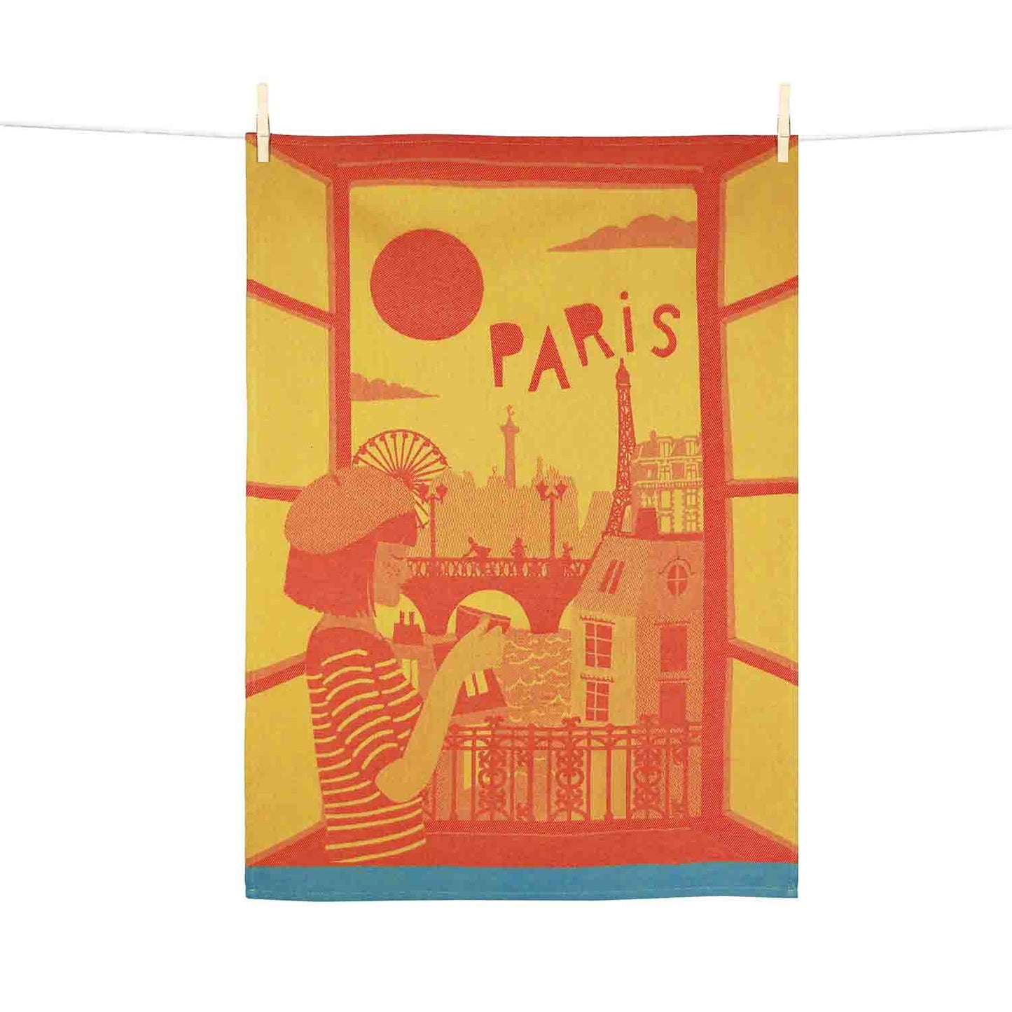 Towel with a design of a person in Paris, featuring the Eiffel Tower and other landmarks.